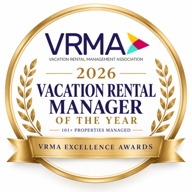 A VRMA 2026 Vacation Rental Manager of the Year excellence awards badge with ribbon, laurel wreaths, and &ldquo;101+ properties managed.&rdquo; logo on footer section.
