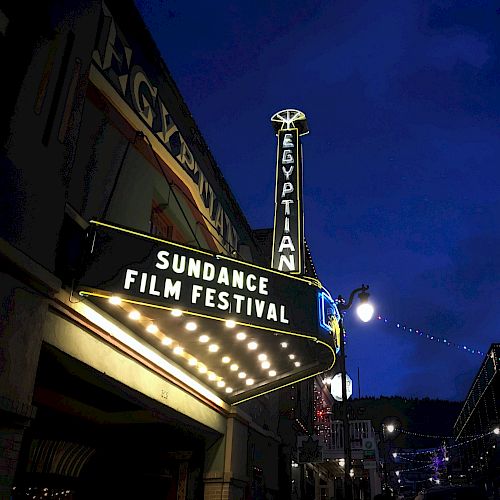 The image shows the Egyptian Theatre with a marquee reading 